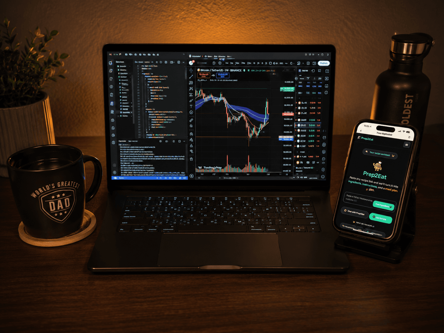 A late-night desk setup with a laptop running Trading Army next to a phone running Prep2Eat